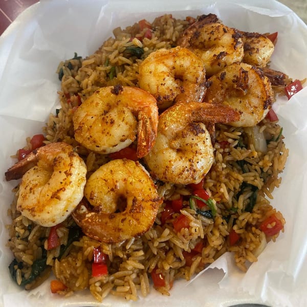 Soul food shrimp and rice with red peppers and spinach from Brunch Bro's 22nd St Cafe & Eatery.